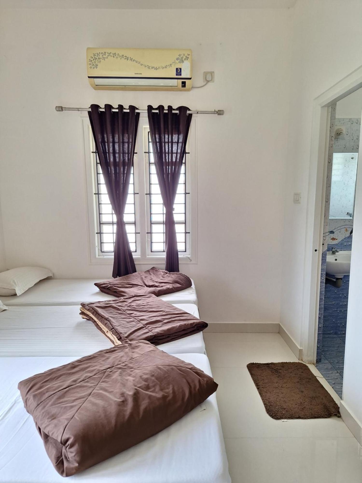 Suvarna Grande Homes Mangalore Værelse billede