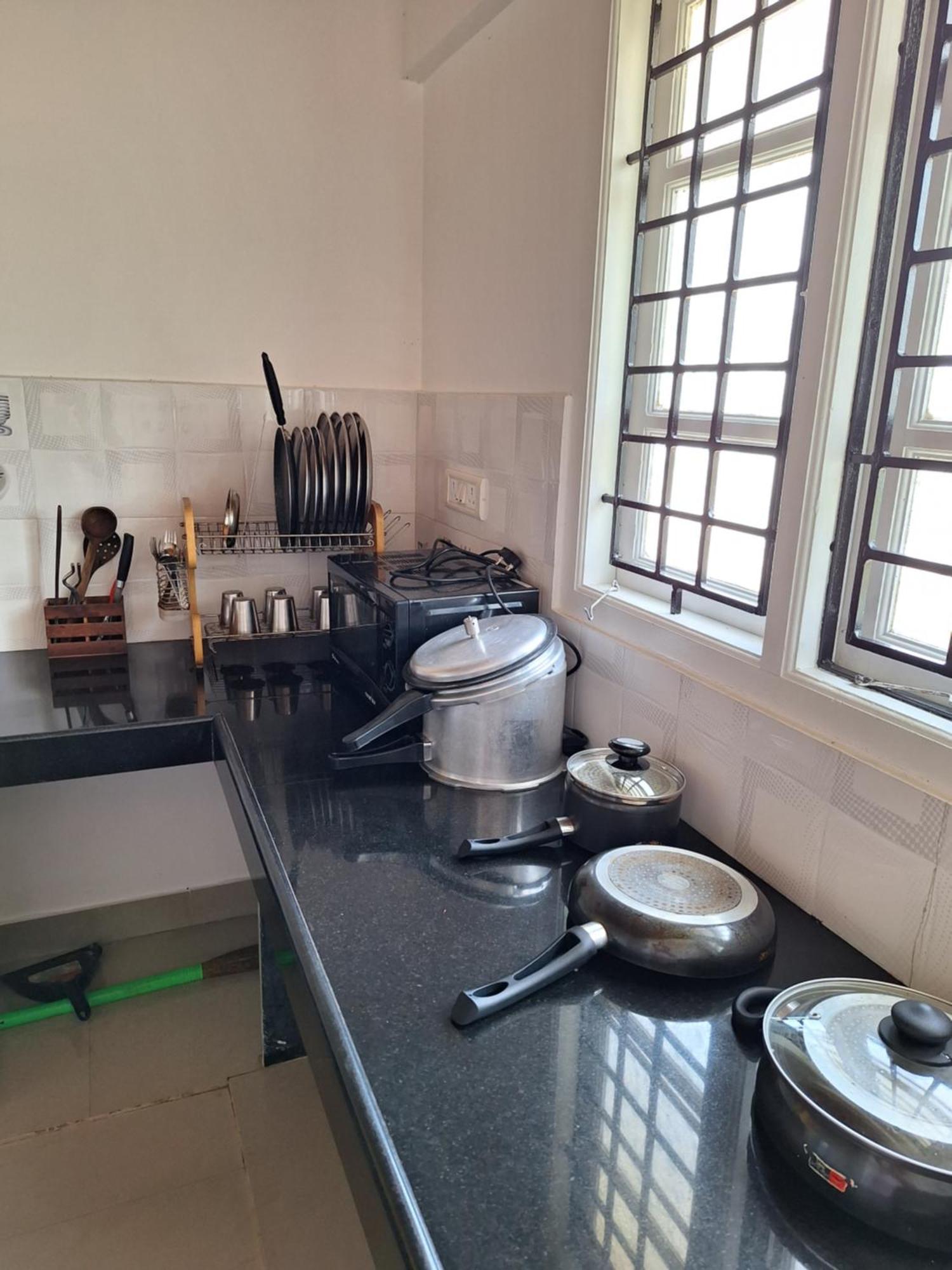 Suvarna Grande Homes Mangalore Værelse billede